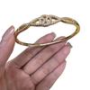 Women's Gold-Plated Copper Bracelet with Rhinestones and Twisted Knot Design