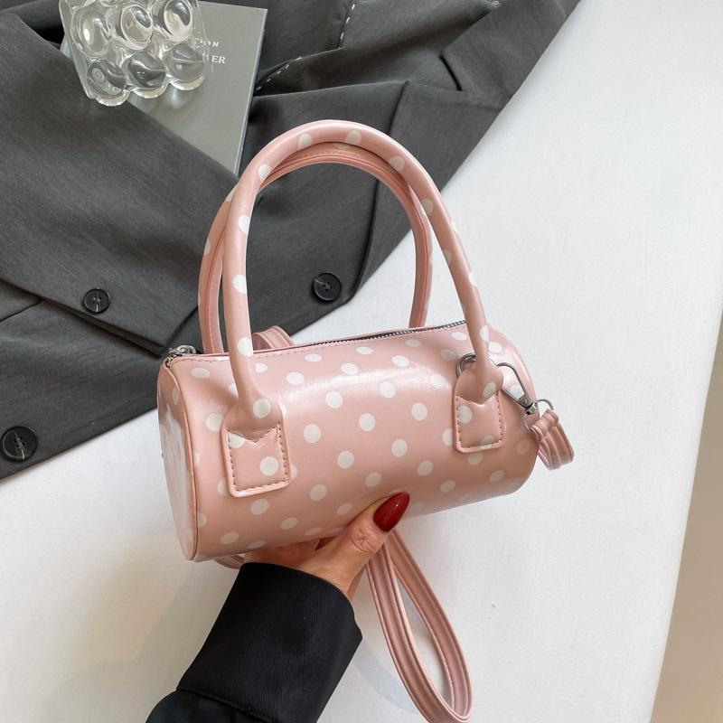 Niche polka dot bag women's 2025 new fashionable versatile underarm messenger bag exquisite portable small bag cylindrical bag