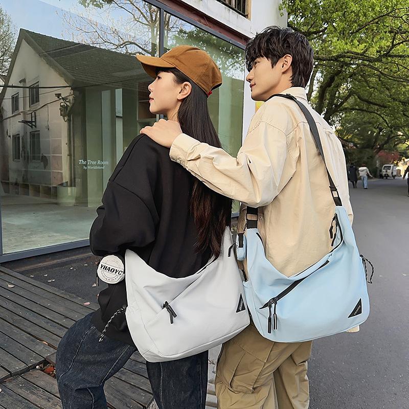 School bag couple messenger bag casual large capacity trendy brand dumpling bag versatile tooling shoulder bag sports lazy wind niche bag