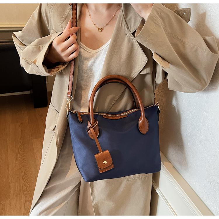 Nylon cloth bag women's large-capacity autumn and winter versatile messenger bag textured portable commuter bucket bag