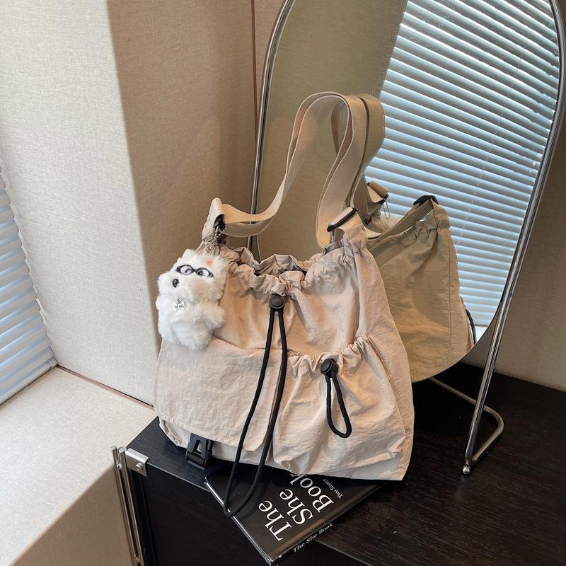 Cloth bag women's large-capacity new summer leisure niche drawstring single shoulder crossbody commuter tote bag