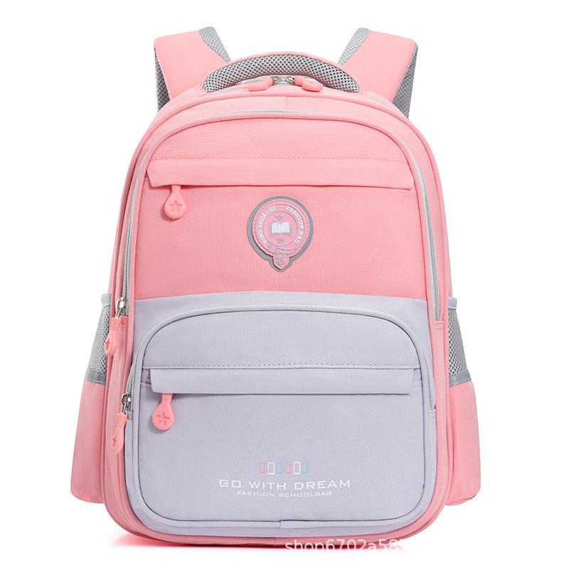 

New primary school bag contrasting color Oxford cloth backpack lightweight children s backpack рожевий