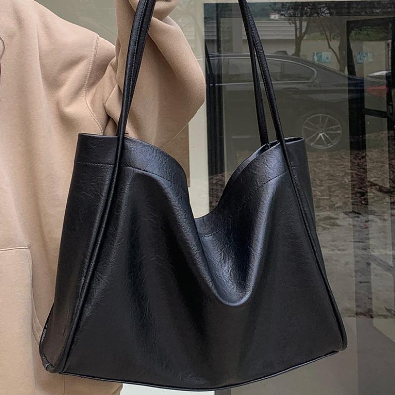 Bag women's new soft leather large-capacity tote bag portable niche design single shoulder armpit bag class commute