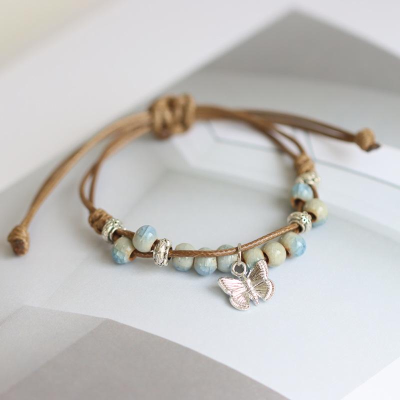 

Fashion Ladies Retro Butterfly Braided Strap Ceramic Beads Bracelet one size