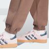 adidas Pantaloni Jogger in Pile Essenziali Originals con Stampa Logo a Lettere Donna Pantaloni Jogger Giallo Chiaro IR5974