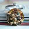 Glass Pendant Keychain With Image Of A Devout Believer Under The