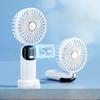 A Folding Handheld USB Fan That Is Compact and Portable. Mini Digital Turbine Fan for Use In A Dormitory, Office Desk.