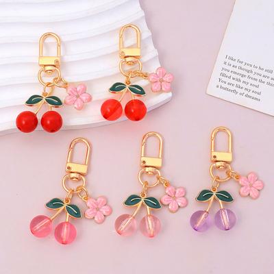 1 stuk 3D kers voor autosleutel, geleiachtige kleur, schattige bedel sleutelhanger, tas sleutelring, metalen sakura bloem, emaille bloem