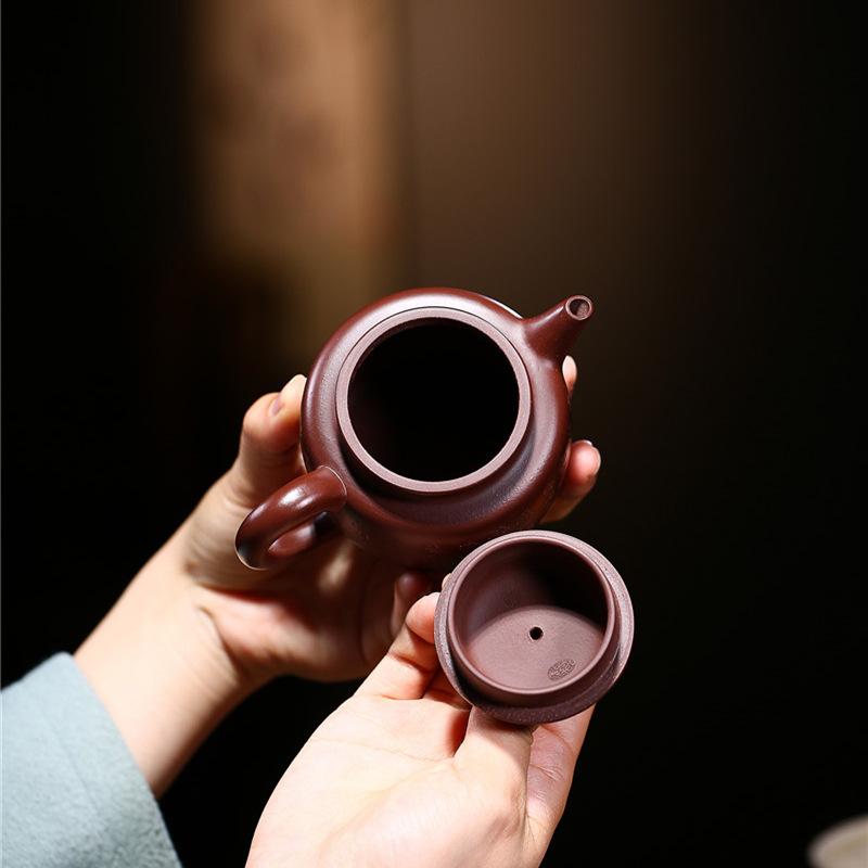 Yixing purple clay teapot hand-carved and painted raw ore purple Zhuni Qinyuan Chunxue Gaode clock teapot 250ml