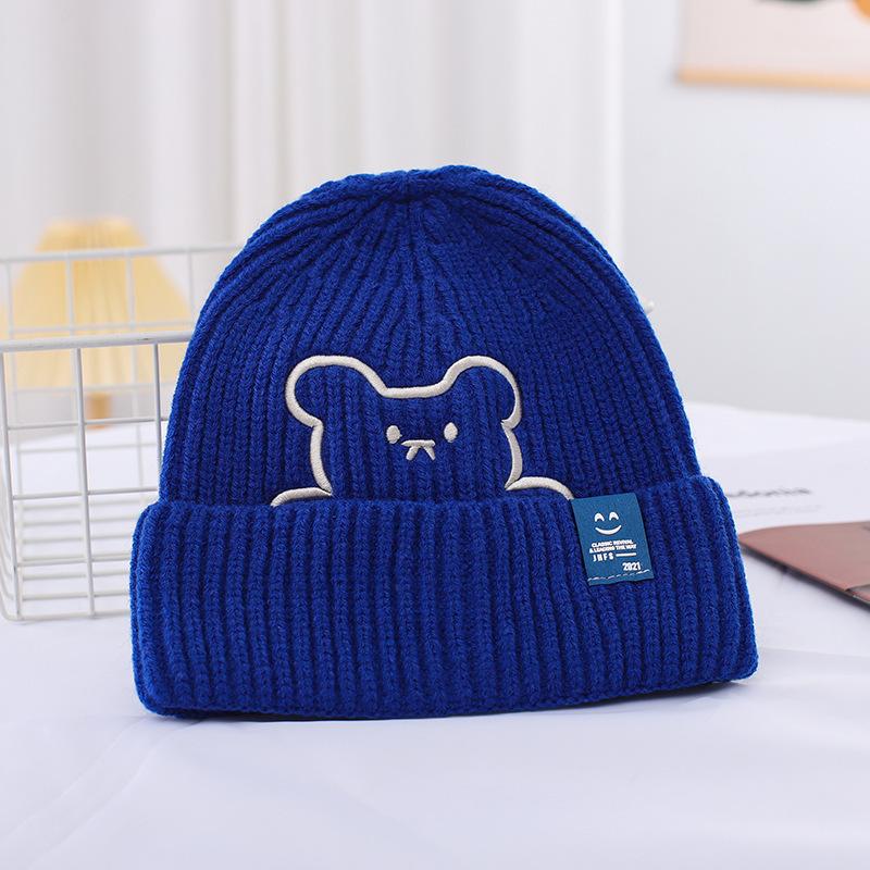 Зимові літерні вовняні шапки Жіночі корейські модні теплі в'язані шапки Шапки для захисту вух