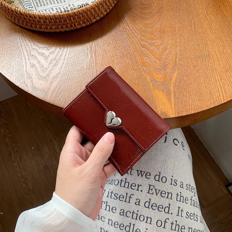 New trendy heart-shaped wallet, fashionable solid color peach heart three-fold small card bag, thin women's short wallet.