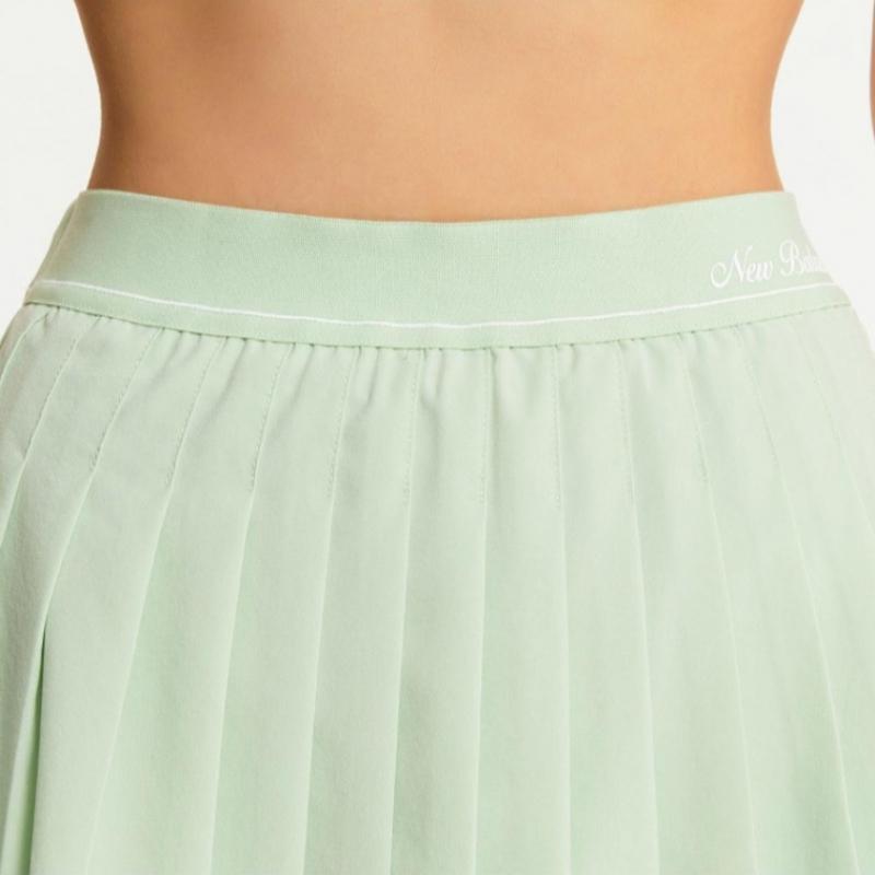 New Balance Shorts Eqs Nbnwe2w522 41 Women Essential Pleated Skirt
