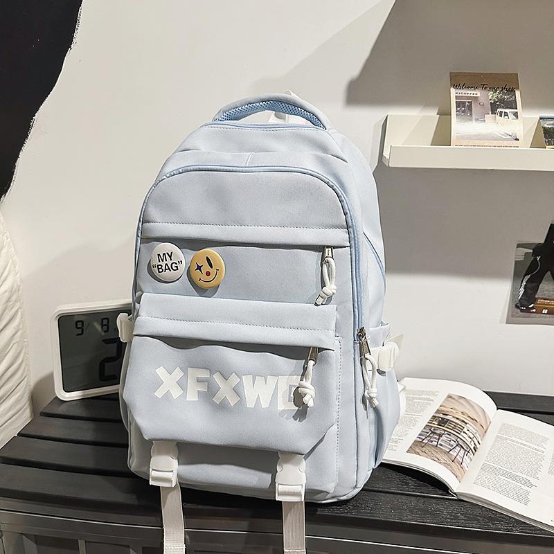 Korean ins style high appearance Harajuku trendy couple backpack junior high and high school students light and large capacity schoolbag girl