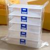 5 large transparent plastic storage boxes with blue lids, stackable beads, earrings, and small item storage boxes