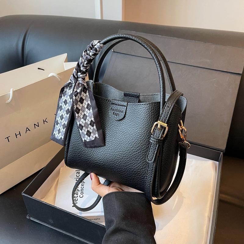 High-end small bag women's new trendy and versatile messenger bag casual bow lychee pattern portable mother bucket bag