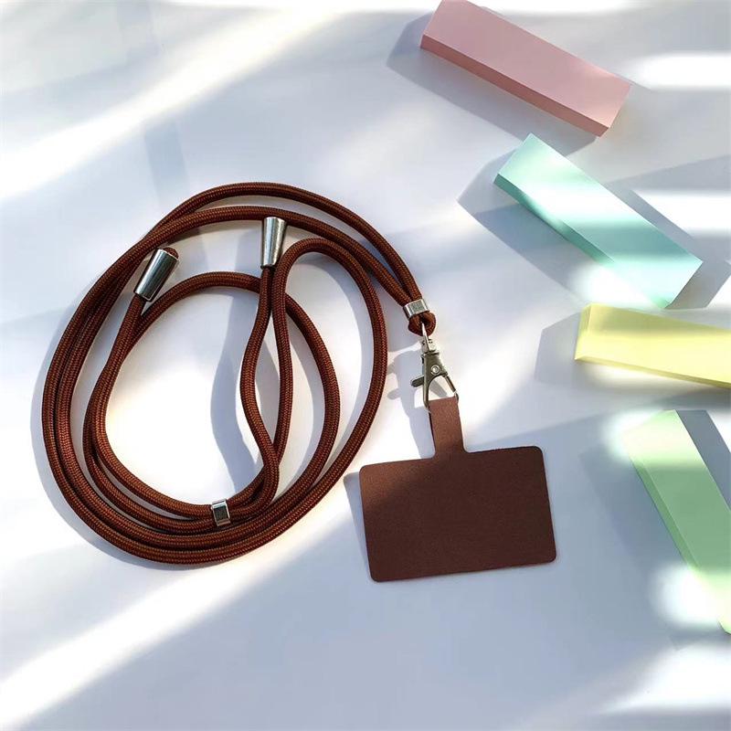 

Универсальный чехол-шнурок для мобильного телефона с регулируемой цепочкой через плечо, препятствующей потере