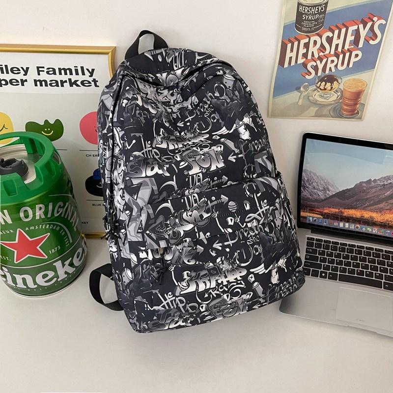 Schulrucksack Graffiti männlicher College-Student hohe Kapazität High School Mittelstufe Schüler Trendmarke Harajuku Trend Rucksack weiblich Ins Cool