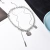 Personalized Titanium Steel Necklace - Stylish Short Double-layered Layered Accessory for Both Men and Women, Featuring Hip-hop Letters As Pendants.