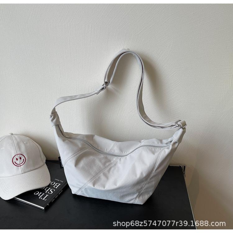 

Nylon cloth bag women s large capacity 2025 new casual high-end one-shoulder crossbody bag simple summer dumpling bag серый