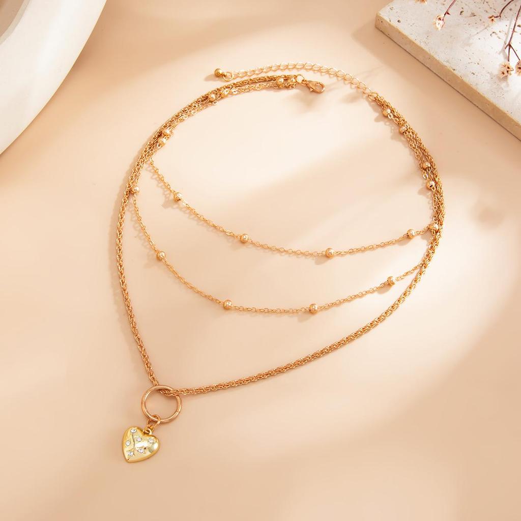 Retro Multi-layer Beaded Necklace with Heart-shaped Rhinestone