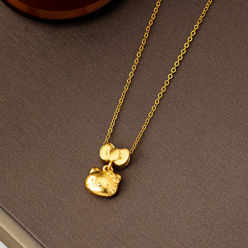 

Вьетнамский золотой кулон-бантик с кошкой - Модный, прочный, нишевый дизайн