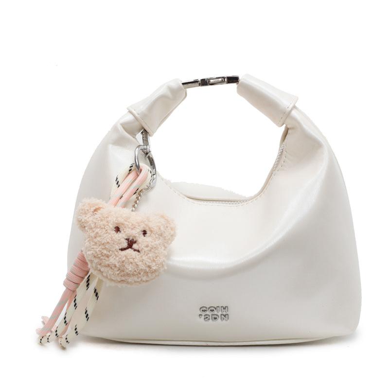 Korean version of fashionable simple high-quality textured wrist dumpling bag niche casual versatile commuter messenger crescent bag women