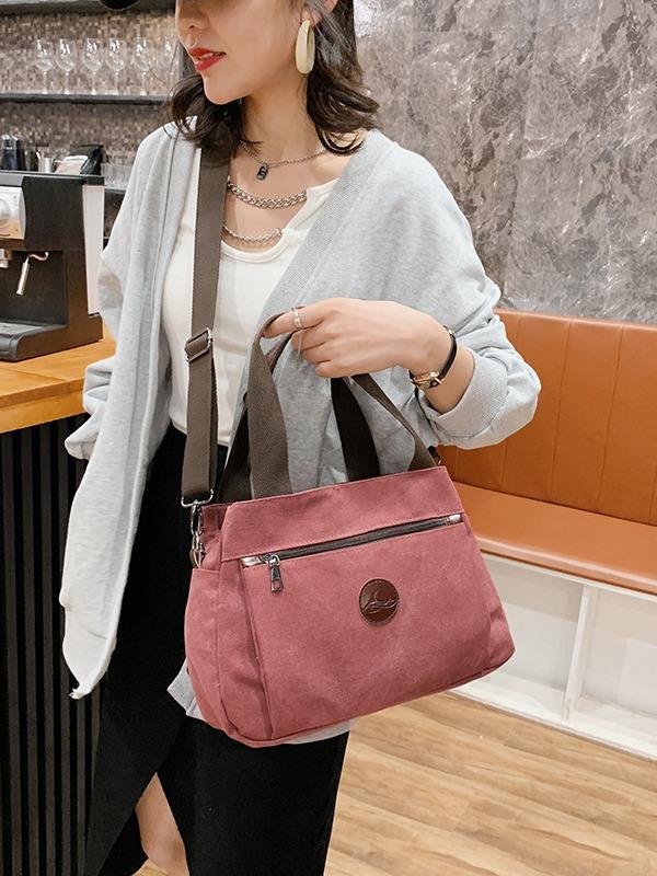 Retro casual women's bag canvas women's hand-held shoulder messenger bag women's large-capacity multi-compartment canvas bag