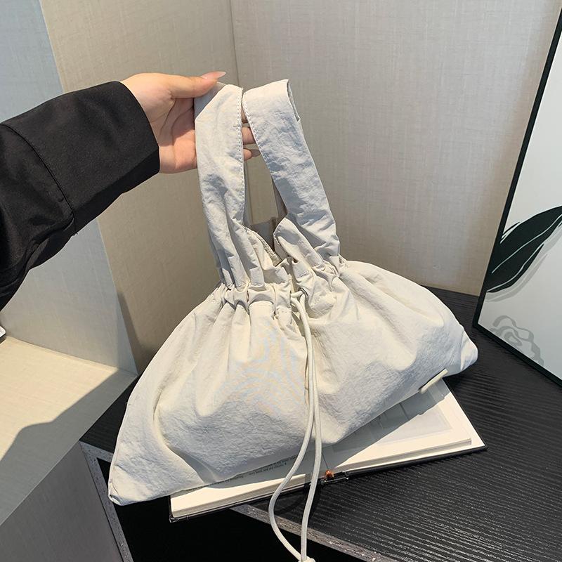 New Women's Retro Bundle Literary and Pastoral Handbag Solid Color Drawstring Commuter Bag