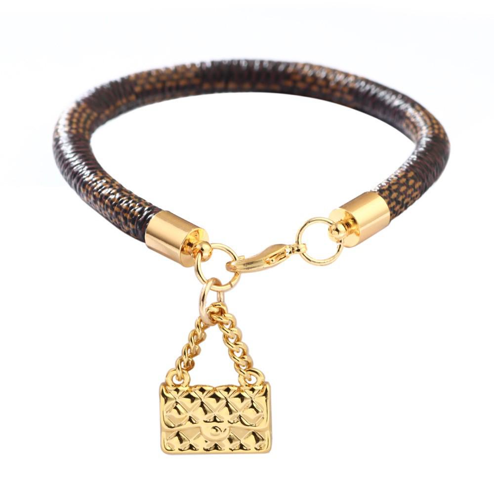 High-End Fashion Stripe Leather Bracelet with Gold-Plated Metal Accents