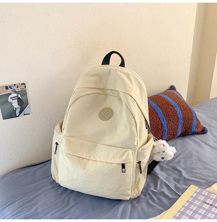 School bag Japanese simple solid color backpack light commuting large capacity student school bag casual versatile outdoor travel backpack