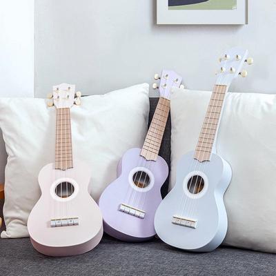 21-calowe ukulele - grywalny instrument muzyczny - mała gitara z wzorzystym logo, idealny prezent
