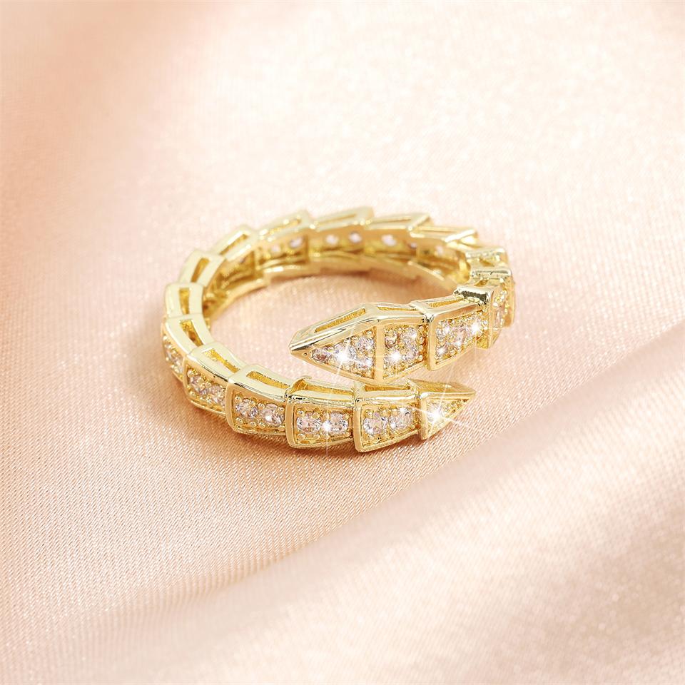 

Htpwe Металлическое кольцо с костью змеи из меди, инкрустированное цирконием, открывающееся, для женщин, с покрытием из 18-каратного золота, парное, праздничный подарок, кольцо для вечеринки, цирконий resizable золотой