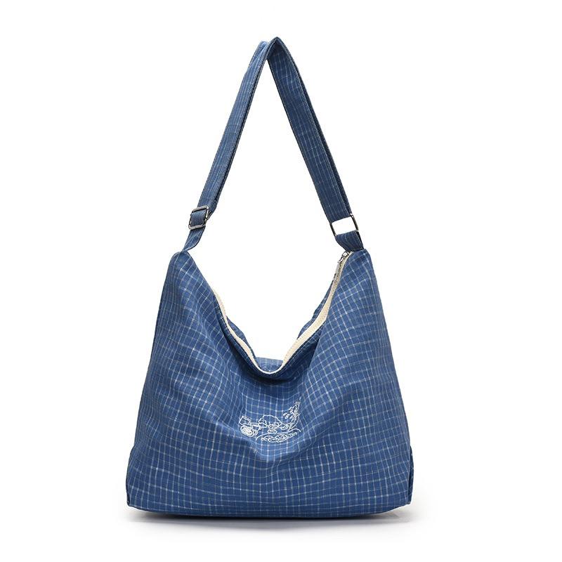 Simple canvas bucket bag women's spring and summer new fashionable versatile plaid large-capacity shoulder bag