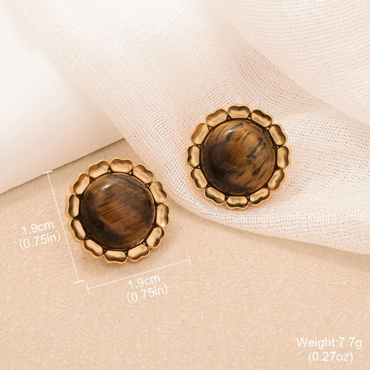 

Tiger eye earrings Maillard earrings Hong Kong style retro high-end round face thin light luxury sunflower design autumn and winter earrings