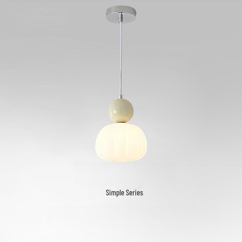Cream Style Pumpkin Pendant Light: Modern Minimalist Bedside Lamp for Master Bedroom, Bar Counter, or Foyer with Single Head Cord Suspension.