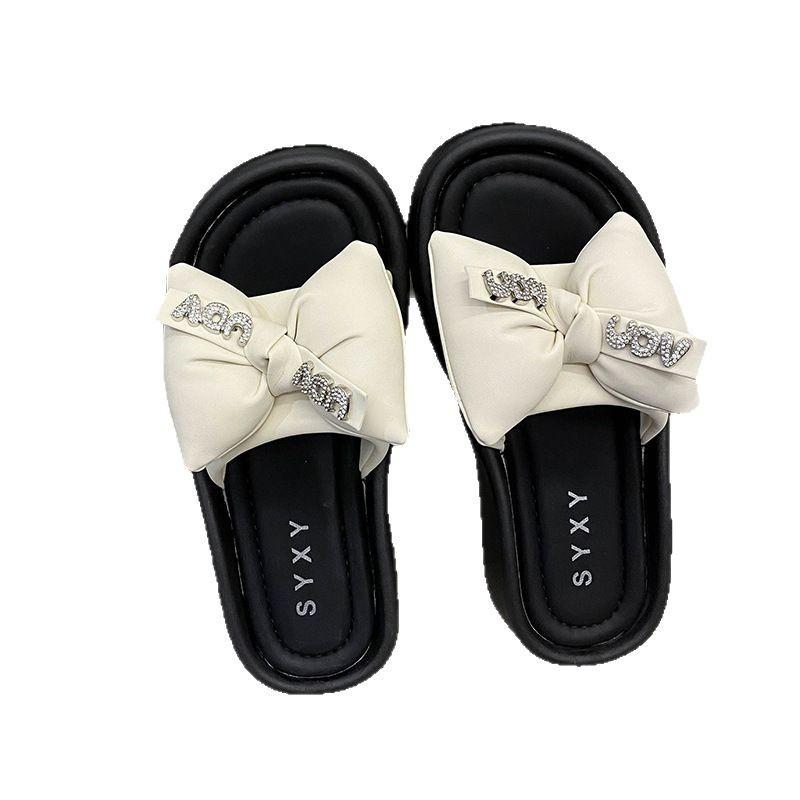 Flat-bottomed slippers women's summer new rhinestone bow word casual beach cool slippers