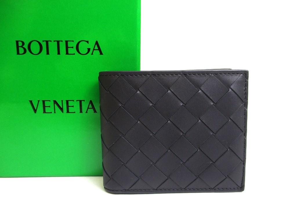 

Автентичний темно-синій шкіряний гаманець BOTTEGA VENETA із двома складками #a594 відремонтований