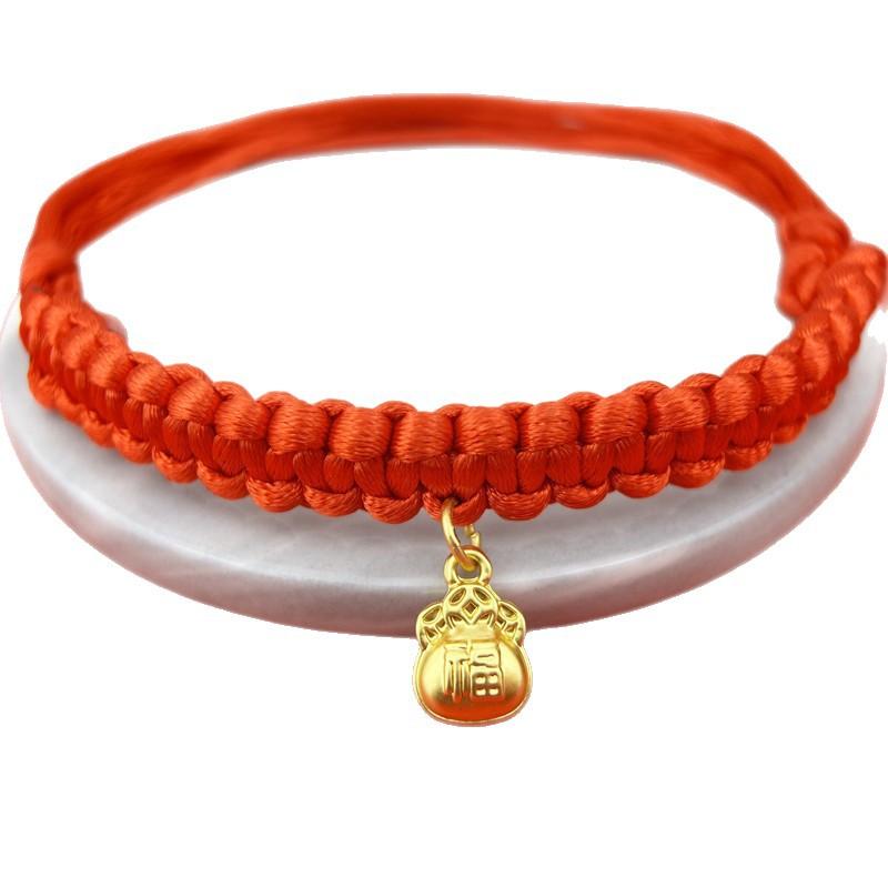 Traditional Chinese-style pet collar with a lucky red string and bell, a festive pet neck accessory for cats and dogs during the Spring Festival