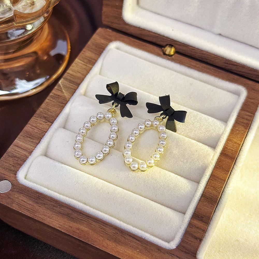 Elegant Gold-Plated Black Zircon Stud Earrings - Niche Design for a Luxurious Fashion Statement