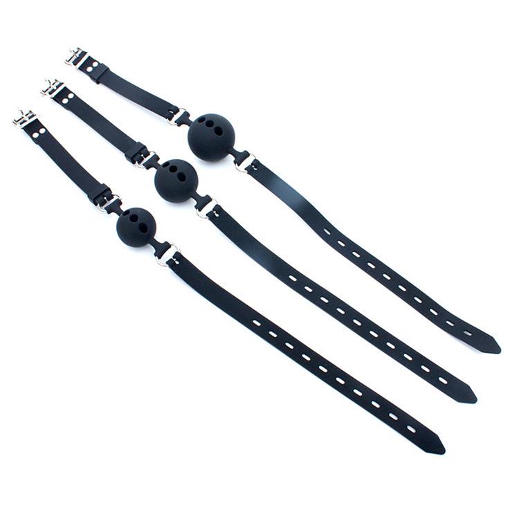 Icele Silicone Oral Sex Gag: Black, Soft Gel Ball with Hole In Various Sizes for Erotic Play.