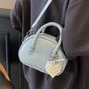 Korean version of the hot-selling cream style portable bowling bag, girls' fashion and advanced sense, foreign style versatile simple messenger bag