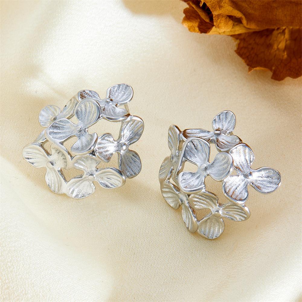 

Легкие роскошные простые серьги из нержавеющей стали, ретро-серьги-цветы из металла, легкие роскошные серьги-гвоздики высокого класса