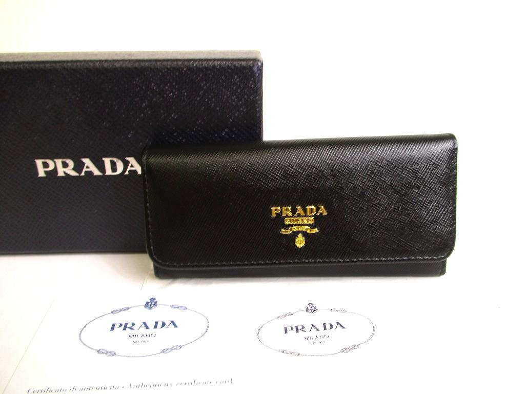 

Оригінальний PRADA Чорна шкіра саф яно 6 фото брелок #a796 Відновлений