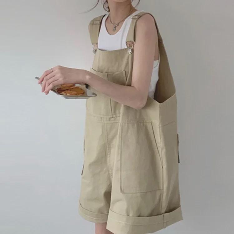 Dámské khaki bavlněné zeštíhlující volné overaly s velkými kapsami - Letní široké šortky na ramínka