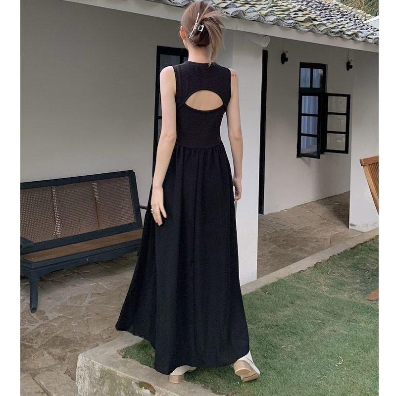 Black round neck sleeveless French retro super fairy knee dress women's spring design hollow backless long dress