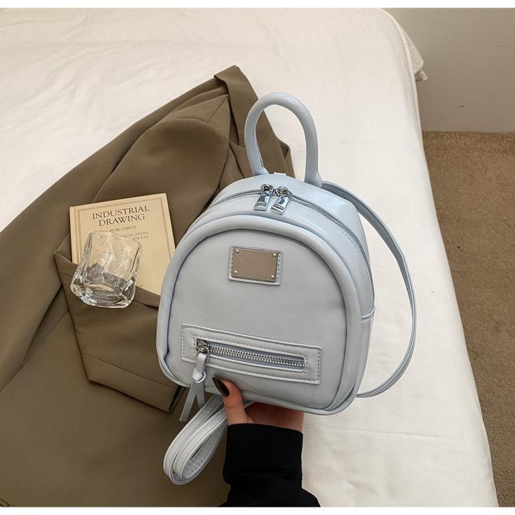 

Однотонный рюкзак из ПУ, корейская версия, нишевый дизайн, студенческий маленький рюкзак, женский, весна 2025, новый, для поездок, для отдыха, школьный рюкзак синий