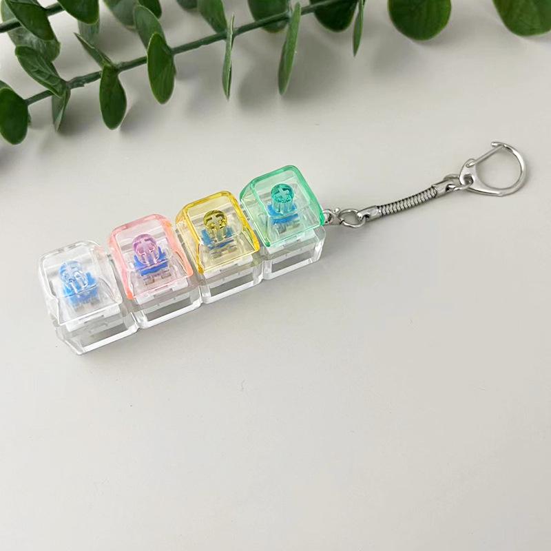 Transparent 4-Key Decompression Keychain with Light and Sound Effects