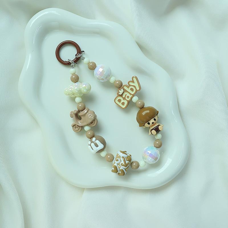 Roztomilá kreslená panenka s korálkovým popruhem na telefon, řetízkem na batoh, přívěskem na klíče, přívěskem proti ztracenému telefonu, dárkem pro iPhone, Samsung a dívku