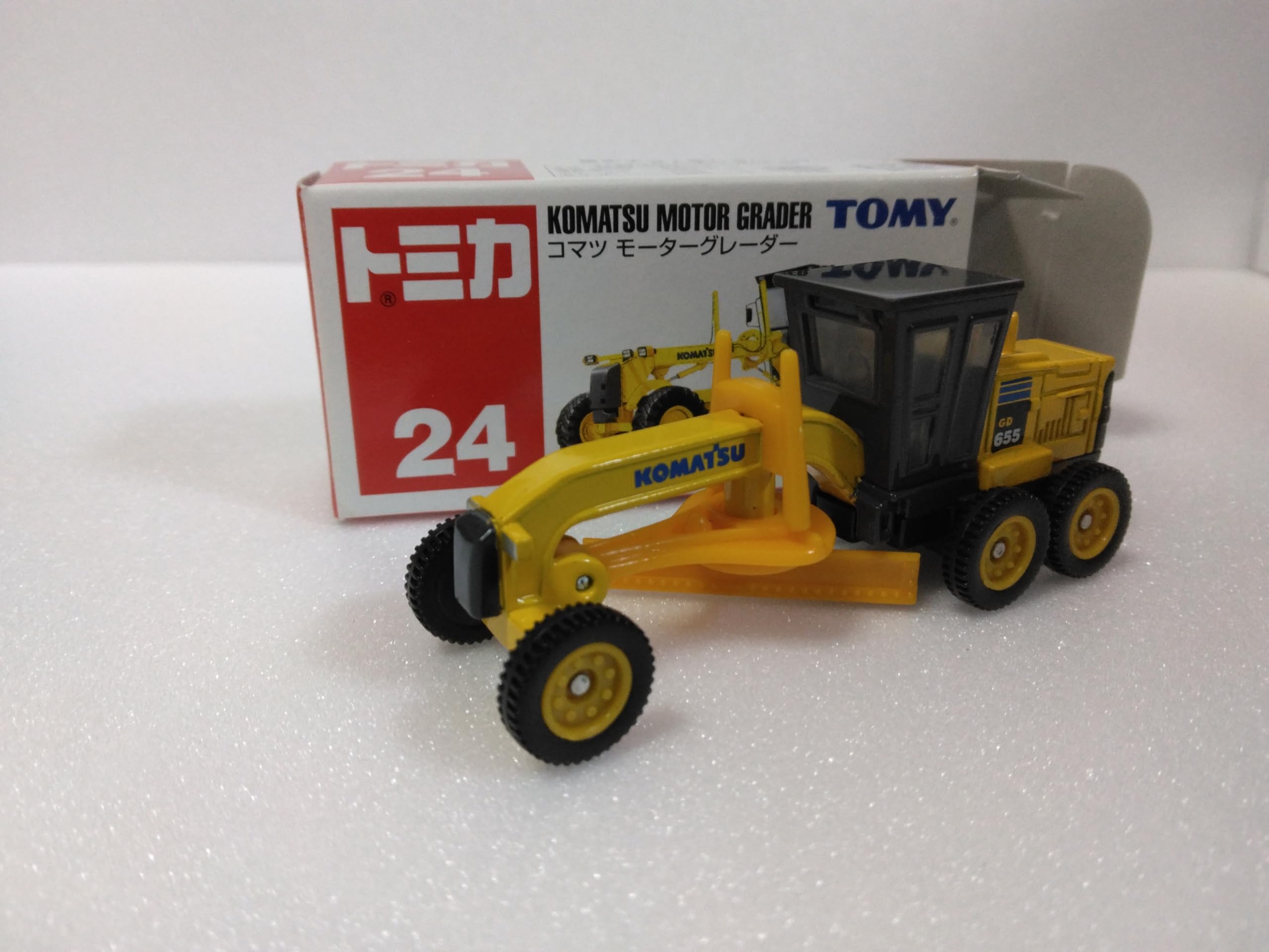 

Микролитражка Tomica Komatsu Motor №24 Грейдер, жёлтая, серебряный