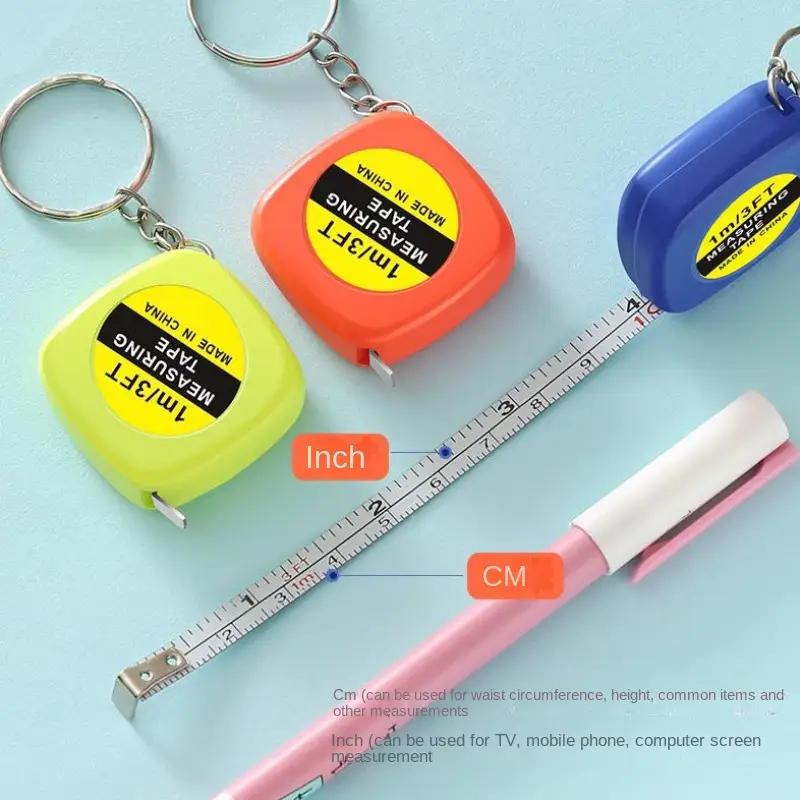 Mini Portable Keychain Tape Measure – 1m Retractable Steel Ruler for Home & Travel